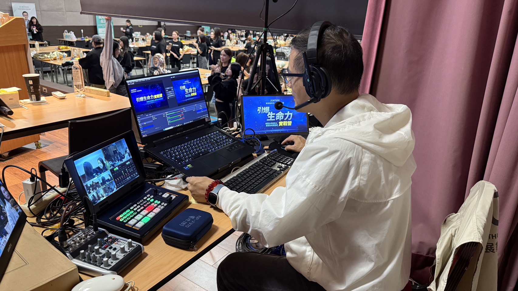 Iridescent ripples of a bright blue and pink liquid